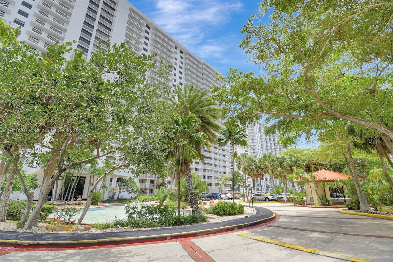 210 174th Street, Unit 2212 Sunny Isles Beach, FL 33160 - Photo 38 of 39 a view of a street with houses on both side