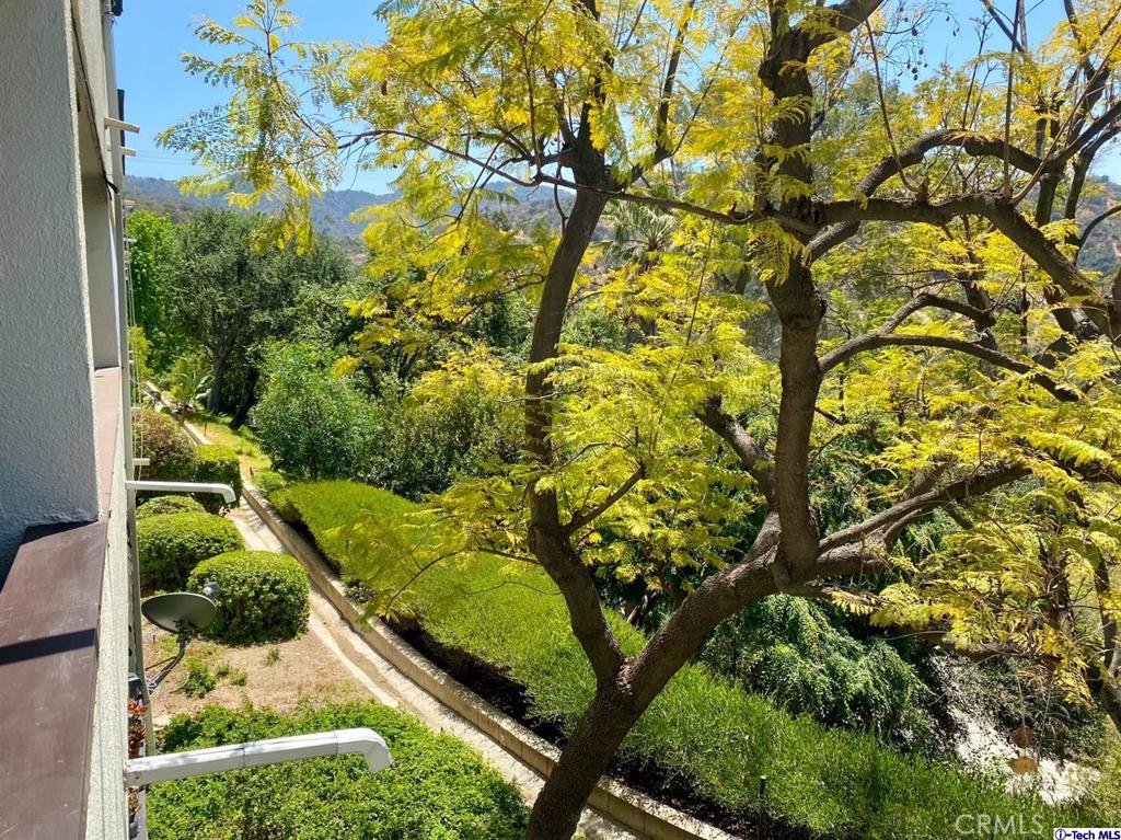 1935 Alpha Road, Unit 328 Glendale, CA 91208 - Photo 7 of 16 a view of swimming pool from a window