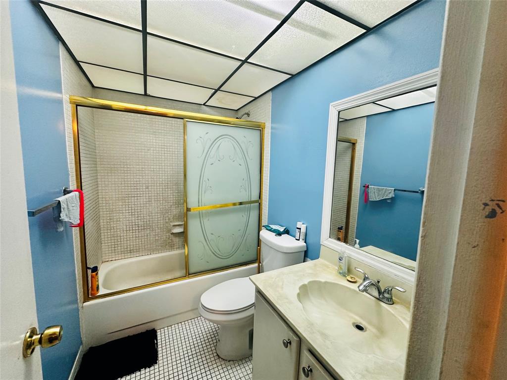 3070 Northwest 48th Terrace, Unit 307 Lauderdale Lakes, FL 33313 - Photo 6 of 13 a bathroom with a sink toilet and shower