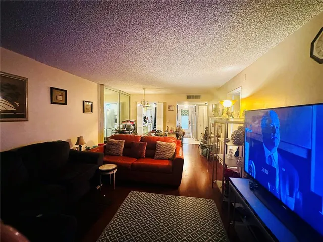 a living room with furniture and a couch