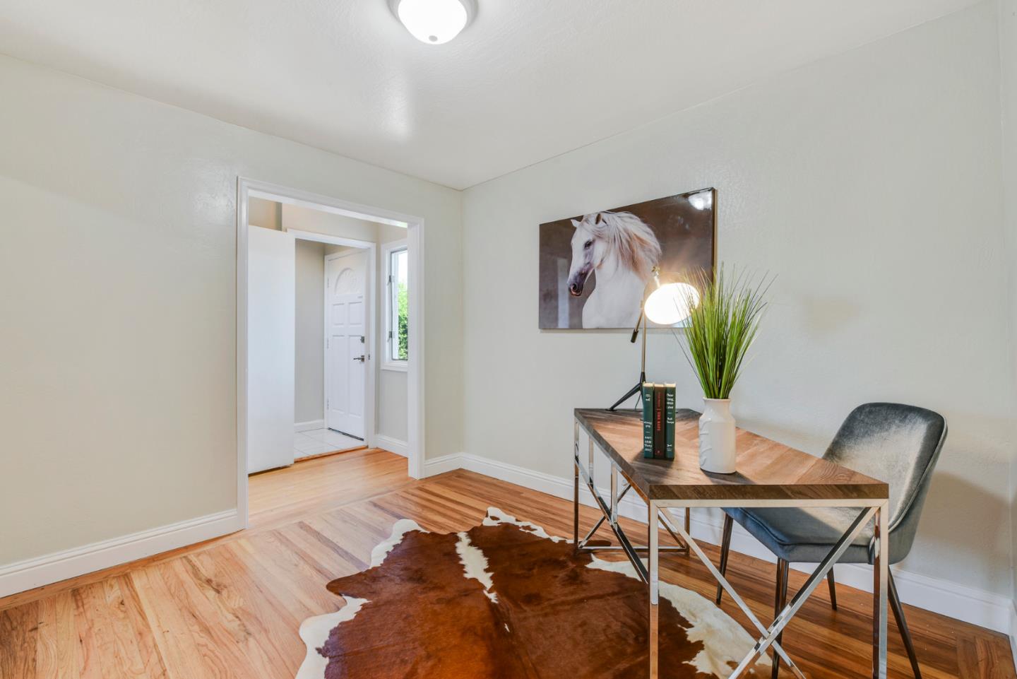 254 Reed Boulevard Mill Valley, CA 94941 - Photo 11 of 21 a workspace with furniture and wooden floor