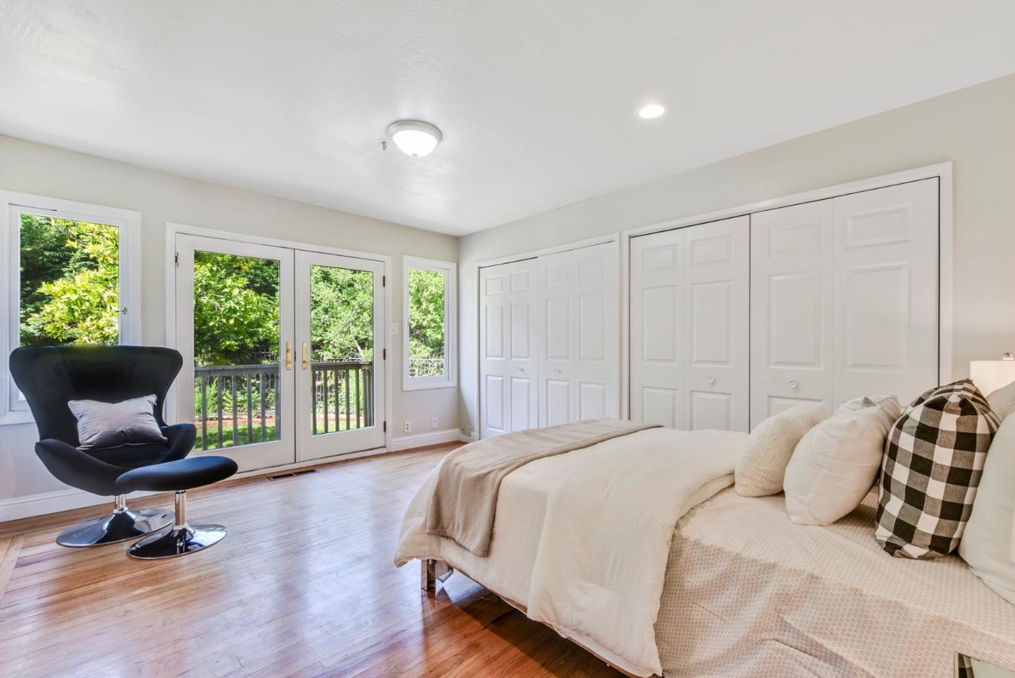 254 Reed Boulevard Mill Valley, CA 94941 - Photo 12 of 21 a bedroom with a bed and a large window