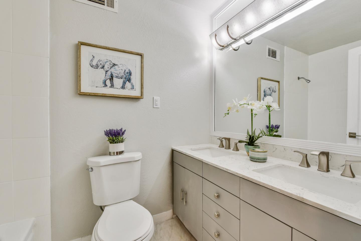254 Reed Boulevard Mill Valley, CA 94941 - Photo 14 of 21 a bathroom with a toilet sink and mirror