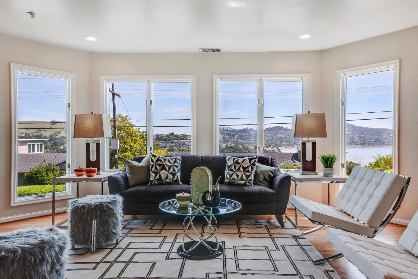 254 Reed Boulevard Mill Valley, CA 94941 - Photo 16 of 21 a living room with furniture and large windows