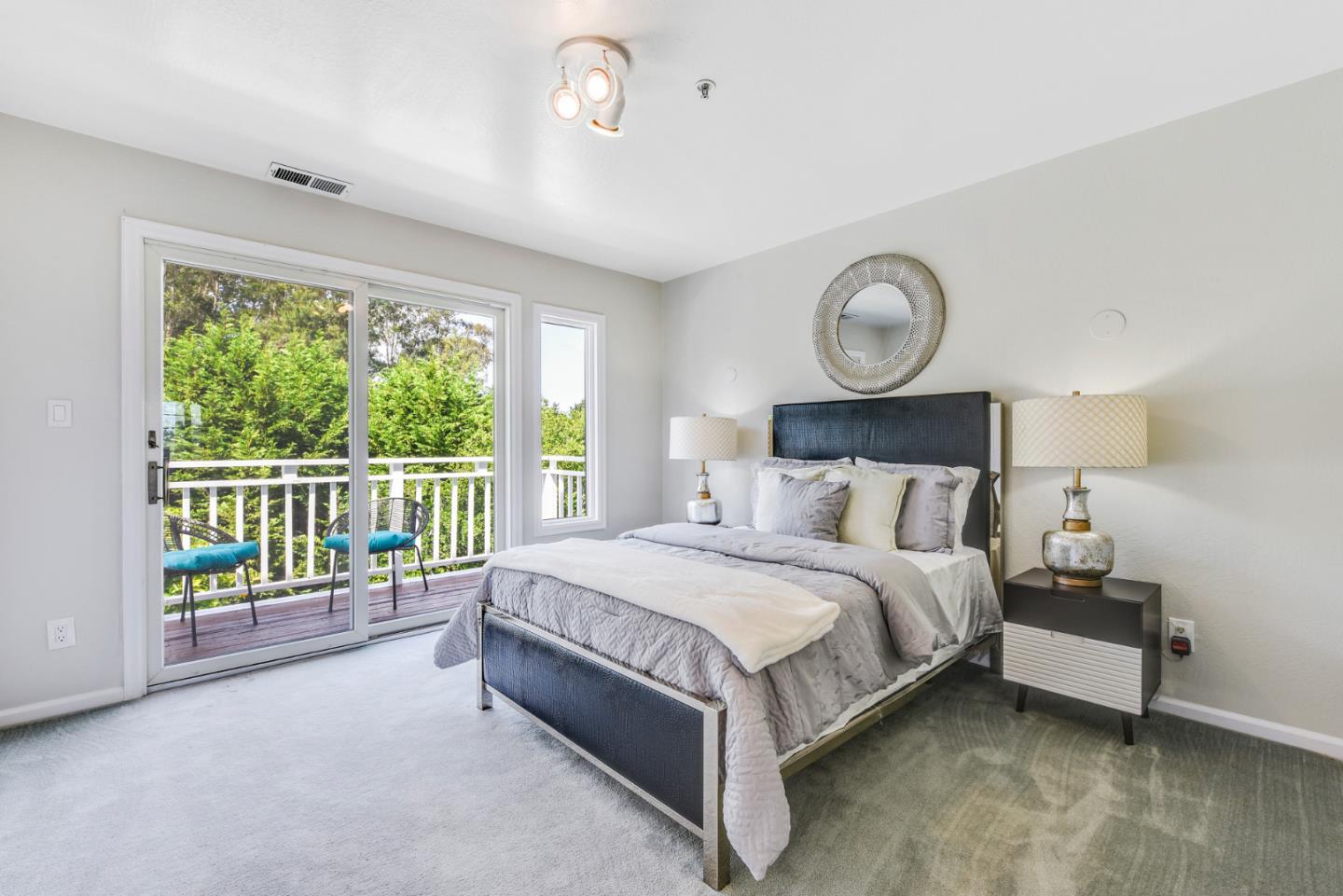254 Reed Boulevard Mill Valley, CA 94941 - Photo 18 of 21 a bed sitting in a bedroom next to a window