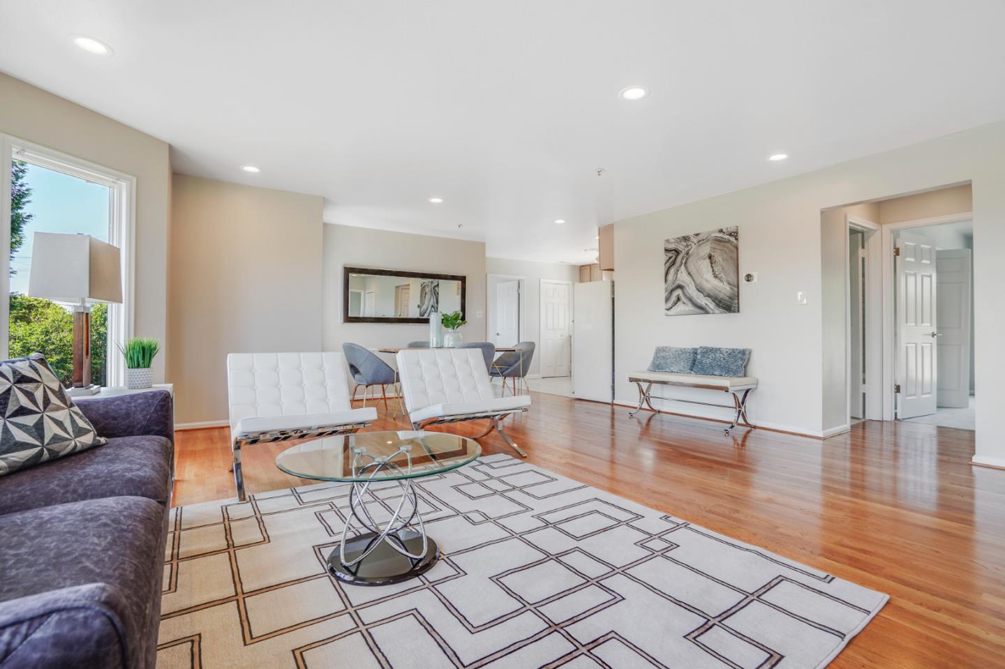 254 Reed Boulevard Mill Valley, CA 94941 - Photo 20 of 21 a living room with furniture and a table