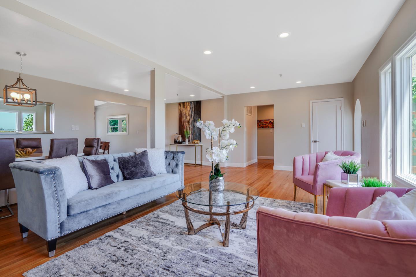 254 Reed Boulevard Mill Valley, CA 94941 - Photo 6 of 21 a living room with furniture and a large window