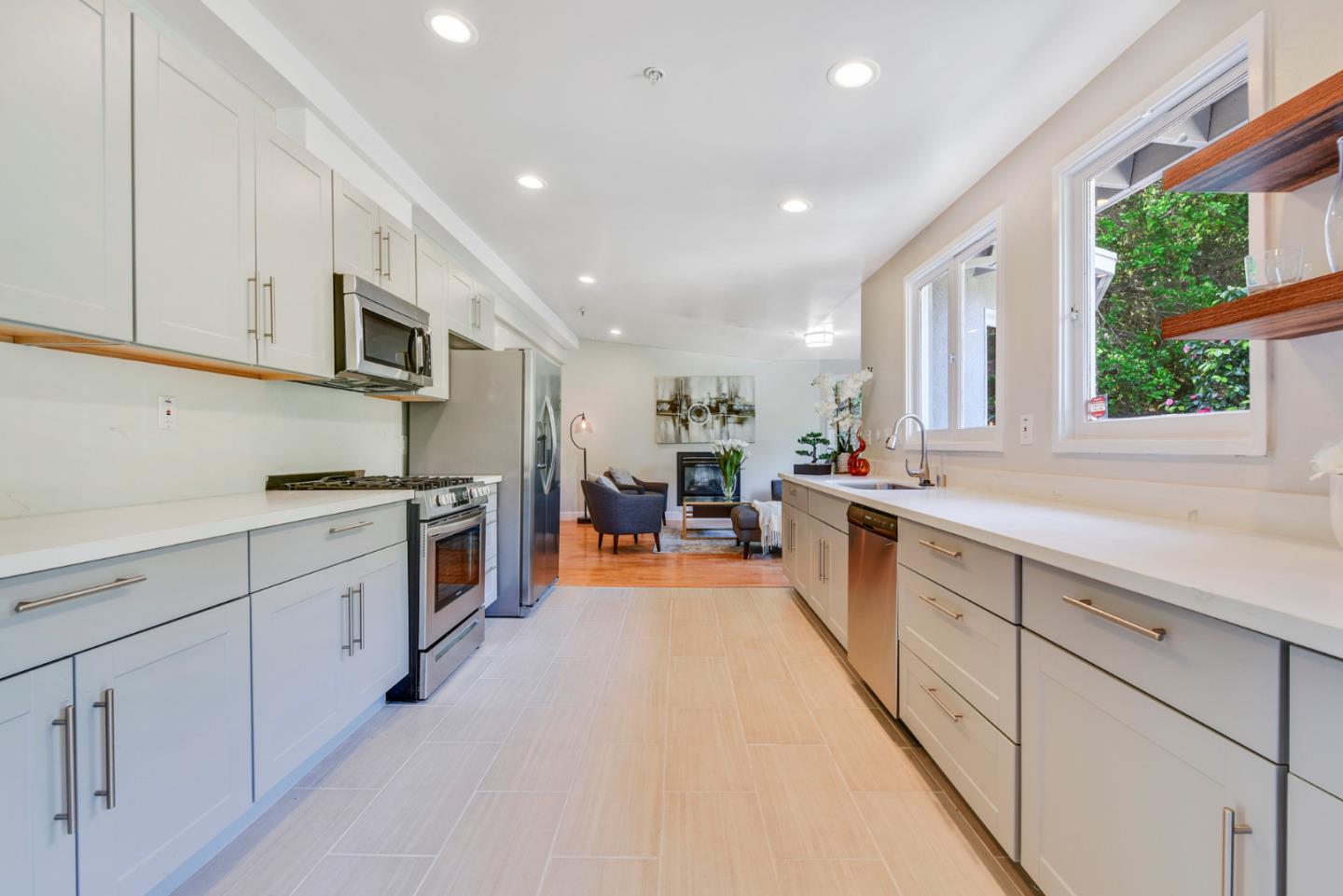 254 Reed Boulevard Mill Valley, CA 94941 - Photo 8 of 21 a large kitchen with stainless steel appliances granite countertop a lot of counter top space and a sink