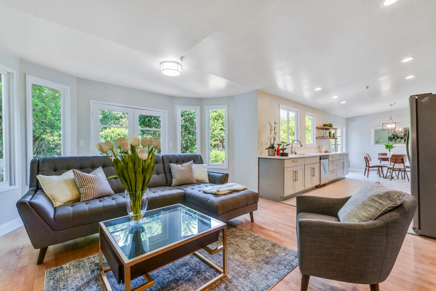 254 Reed Boulevard Mill Valley, CA 94941 - Photo 9 of 21 a living room with furniture and a large window