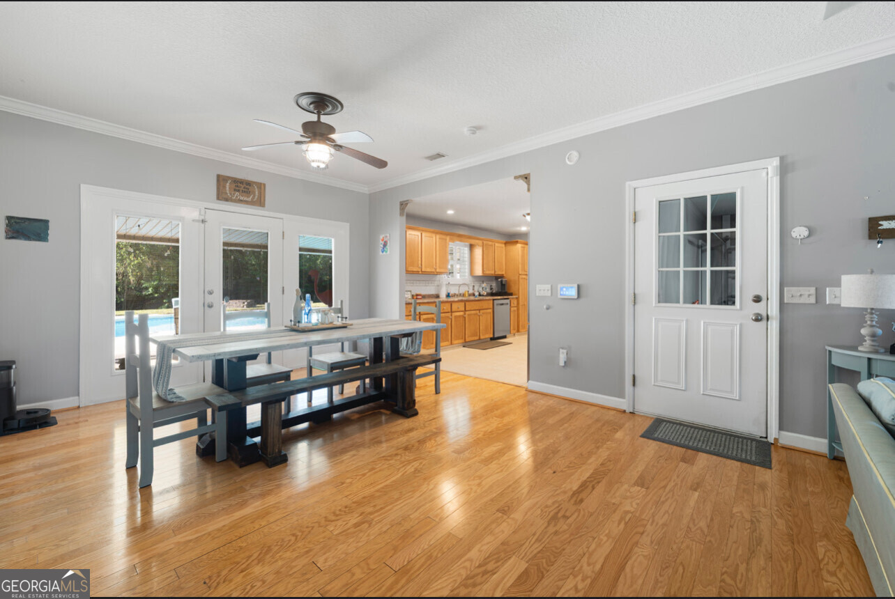 646 Corey Street Baxley, GA 31513 - Photo 12 of 21 a living room with furniture and wooden floors