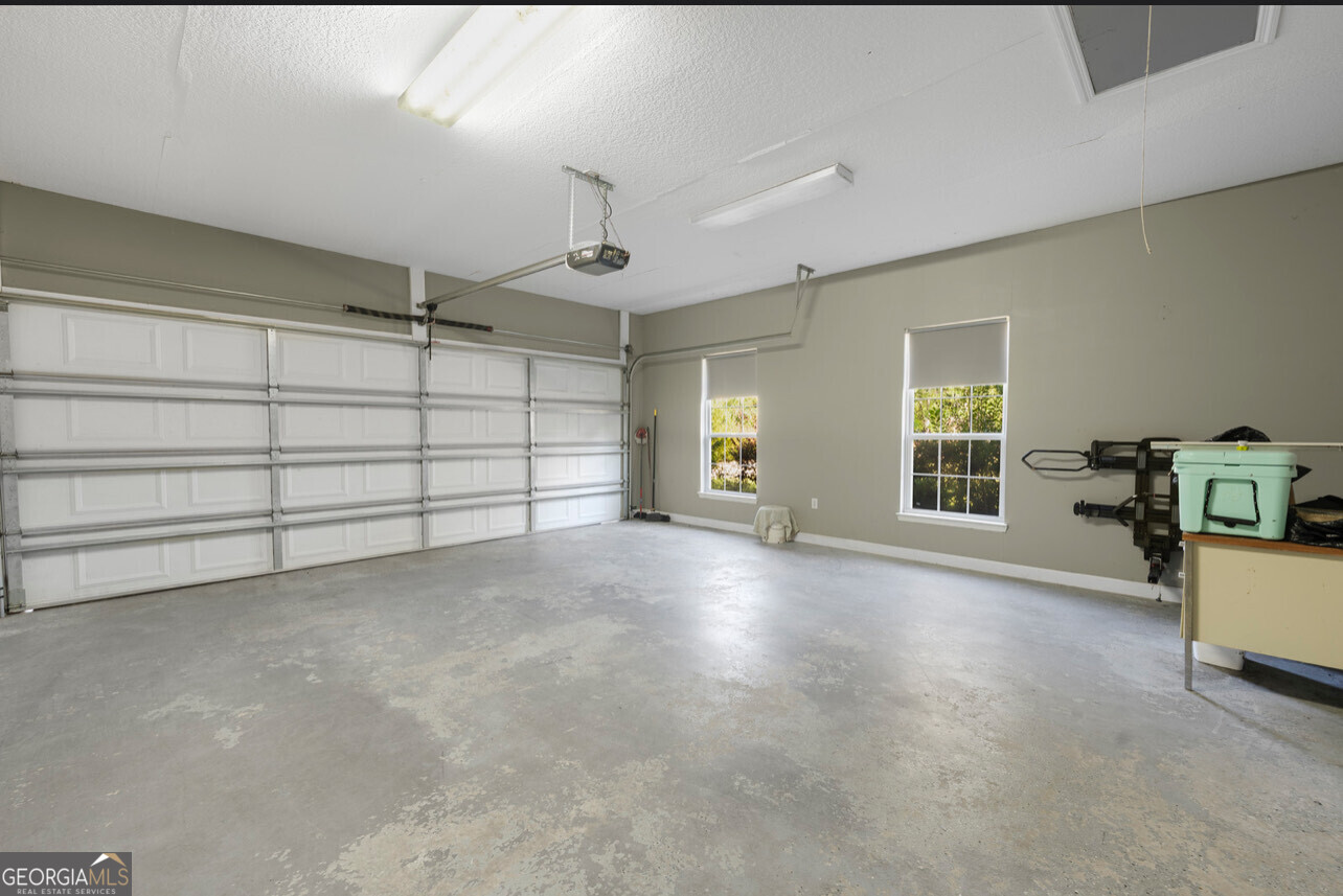 646 Corey Street Baxley, GA 31513 - Photo 9 of 21 a view of a livingroom with furniture and a window