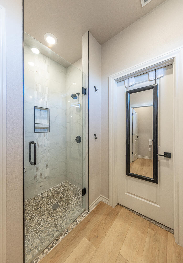 6913 15th Street Lubbock, TX 79416 - Photo 14 of 27 a view of a bathroom
