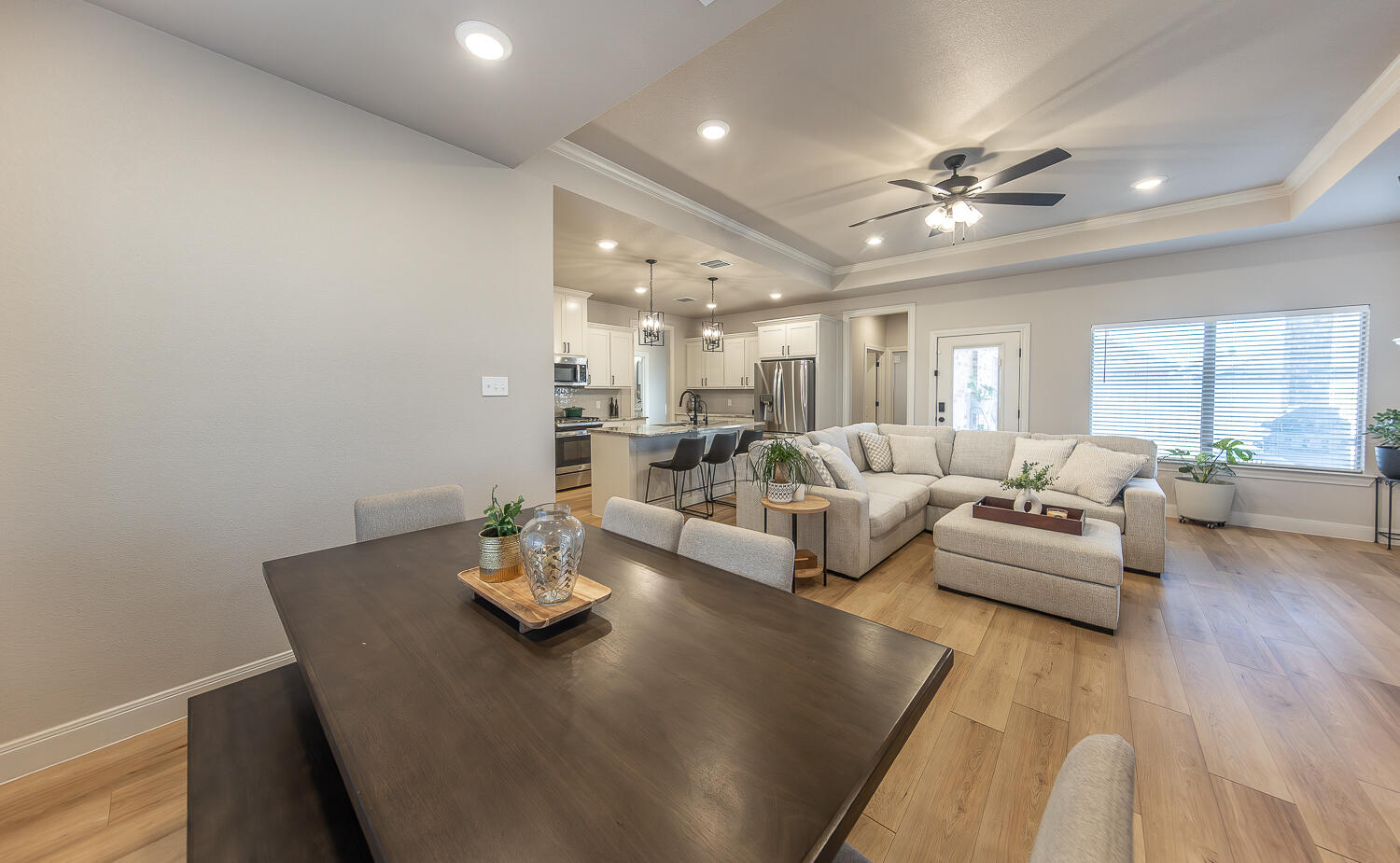 6913 15th Street Lubbock, TX 79416 - Photo 8 of 27 a living room with furniture and wooden floor