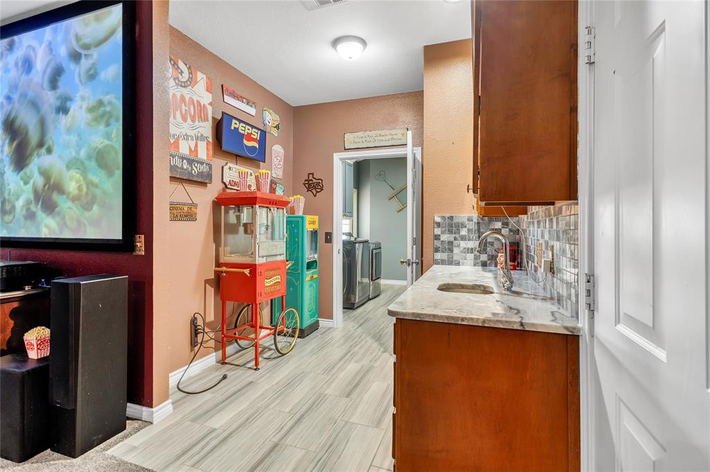 47 Preakness Place Road Van Alstyne, TX 75495 - Photo 13 of 37 Popcorn machine and candy machine stay with the movie room