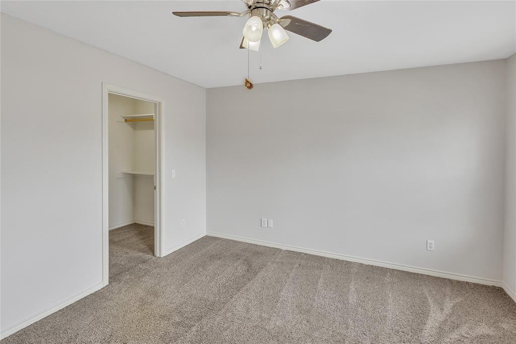 47 Preakness Place Road Van Alstyne, TX 75495 - Photo 37 of 37 Bedroom at the end of the hall upstairs, closet has an additional room located adjacent for more storage