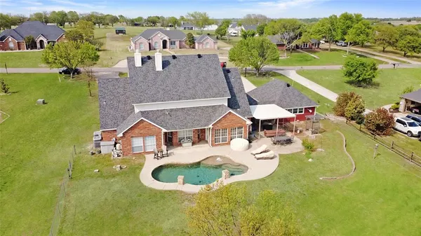 a aerial view of a house with a garden