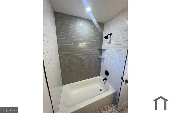 a bathroom with a bathtub