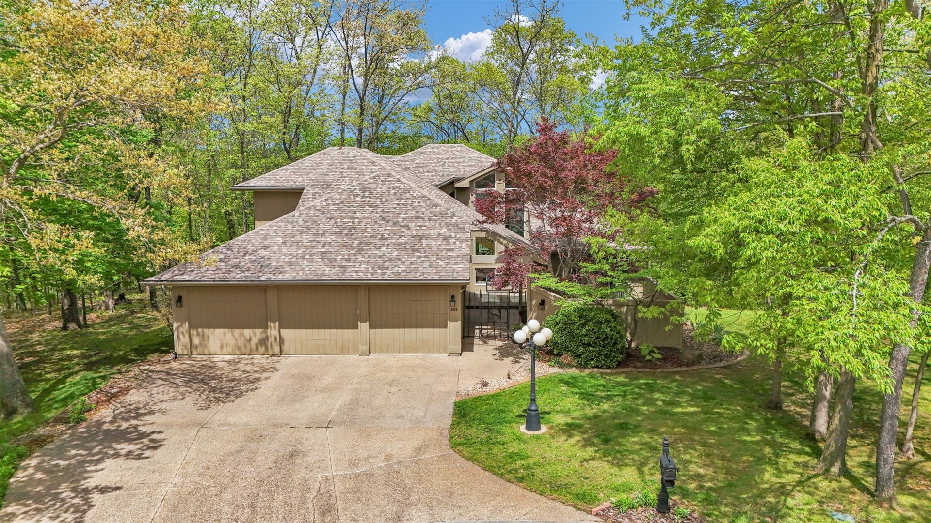 5353 Bailey Avenue Clinton, IL 61727 - Photo 1 of 72 a front view of a house with a yard and trees