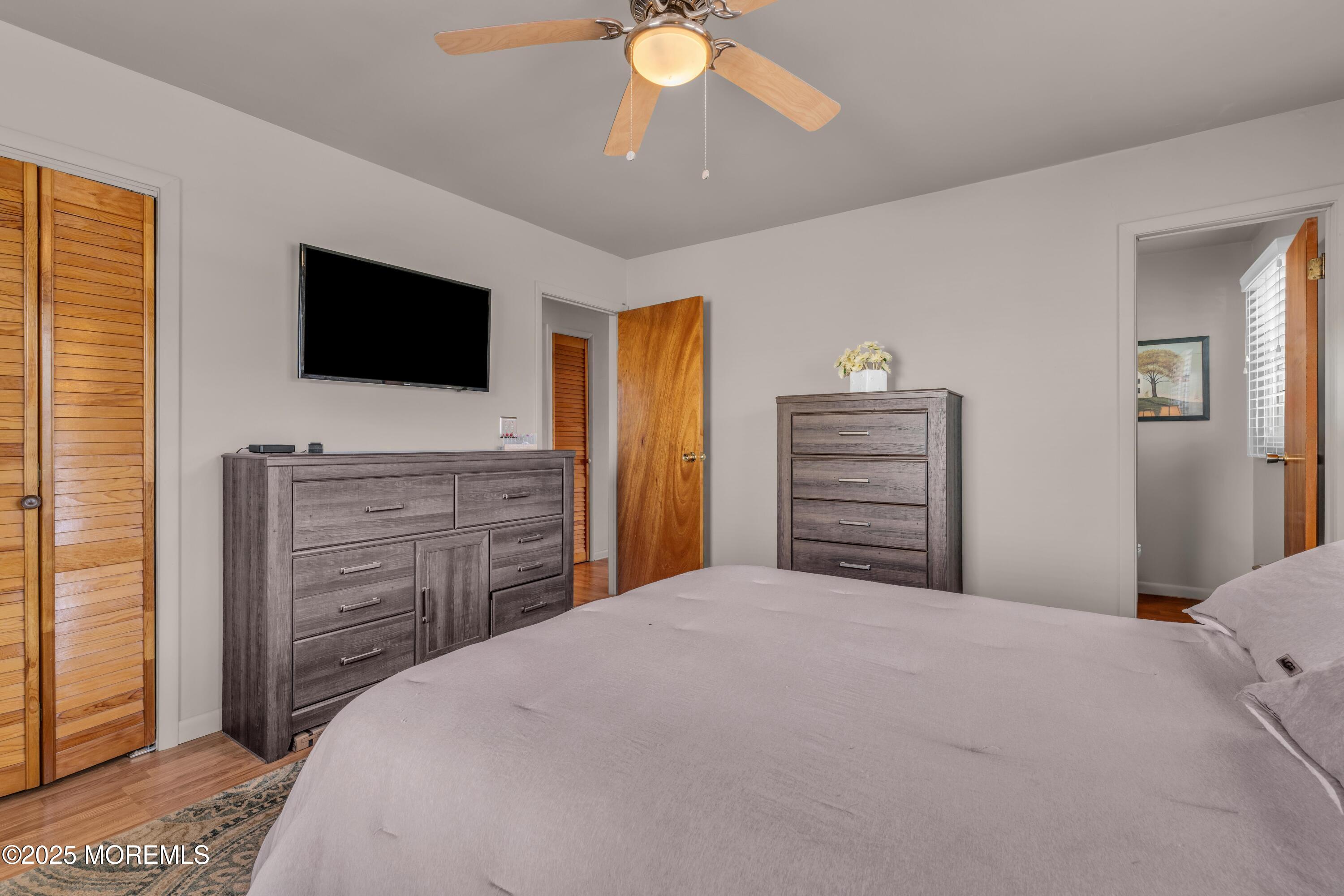 181 Mast Road Brick, NJ 08723 - Photo 15 of 24 a bedroom with a bed and a flat screen tv