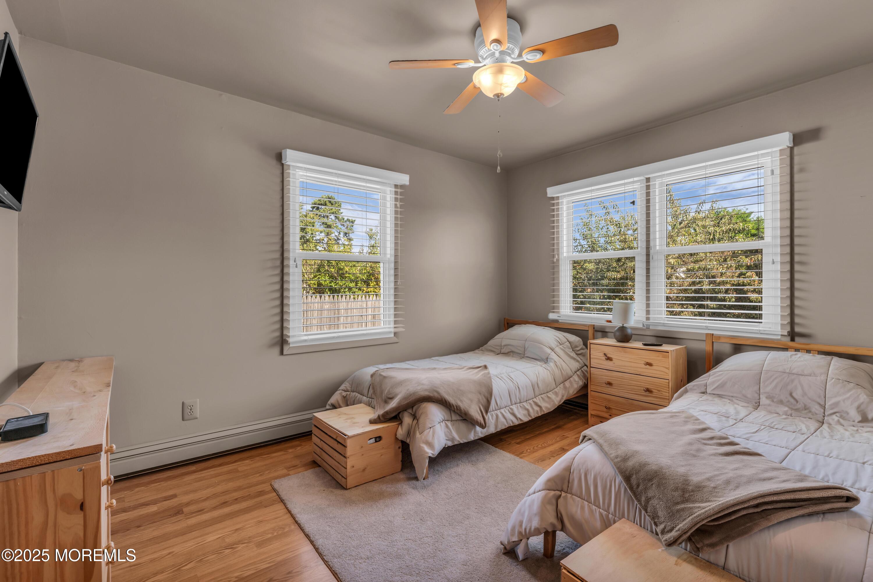 181 Mast Road Brick, NJ 08723 - Photo 17 of 24 a bedroom with two beds and a window