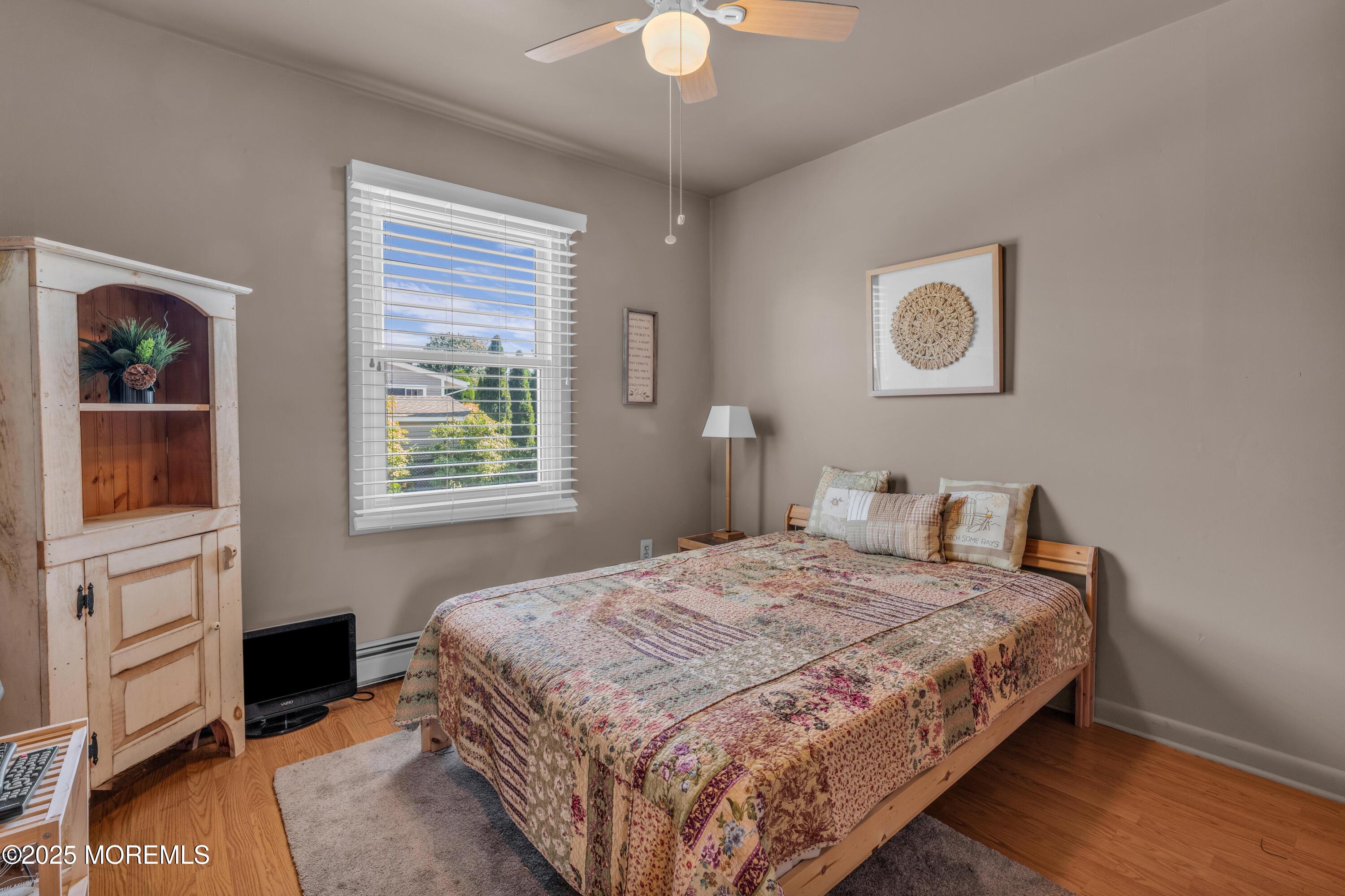 181 Mast Road Brick, NJ 08723 - Photo 18 of 24 a bedroom with a bed and a window