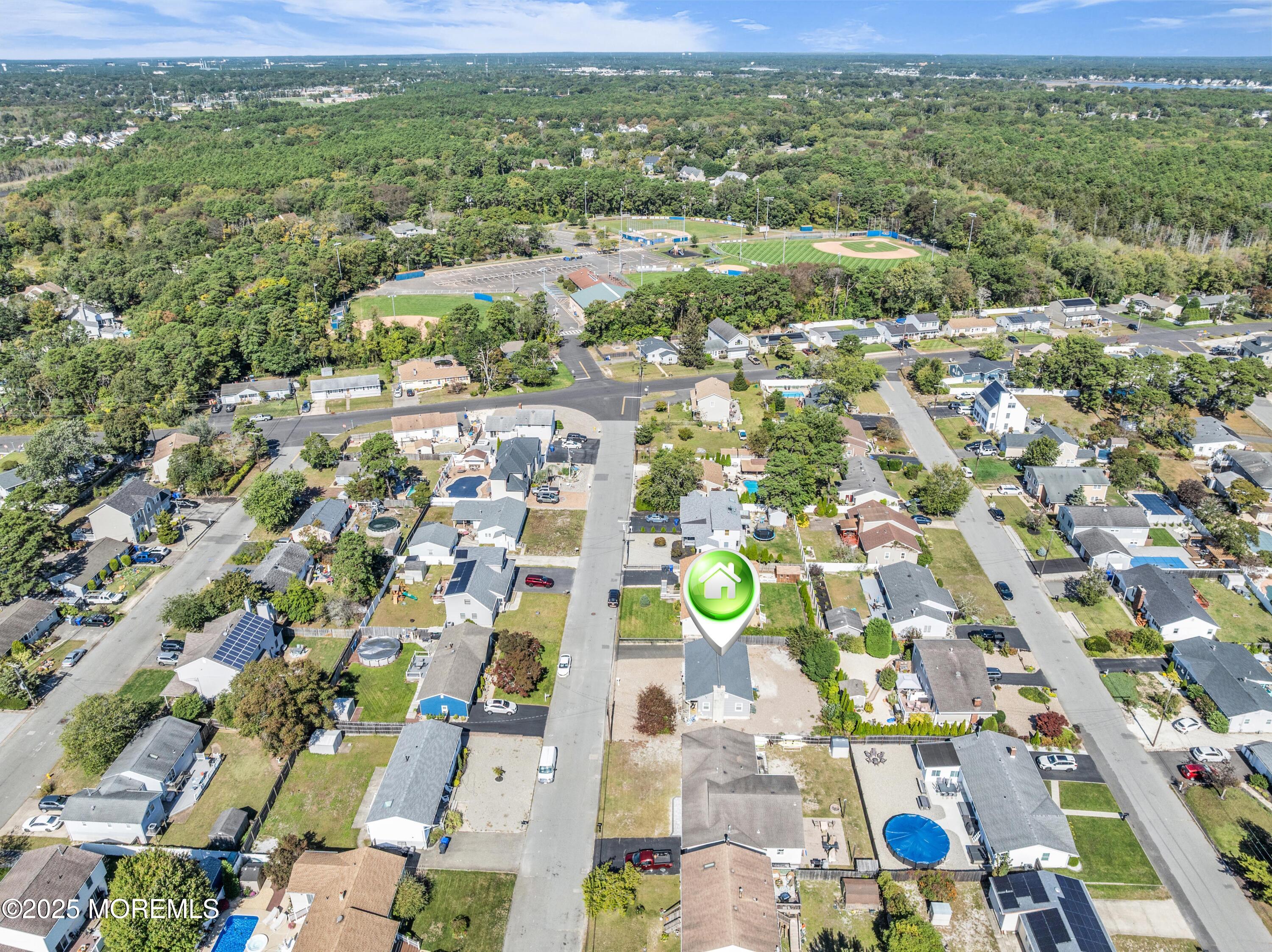 181 Mast Road Brick, NJ 08723 - Photo 20 of 24 an aerial view of residential houses with outdoor space