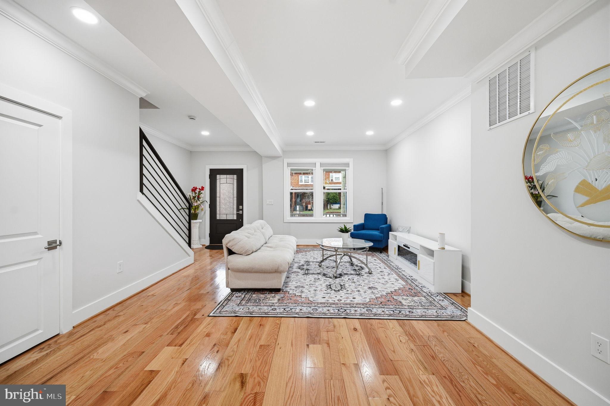 4902 4th Street Northwest Washington, DC 20011 - Photo 4 of 24 a living room with furniture and wooden floor