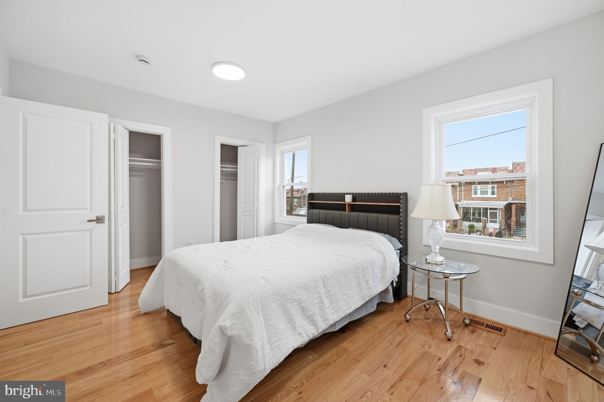 4902 4th Street Northwest Washington, DC 20011 - Photo 10 of 24 a bedroom with a bed and wooden floor