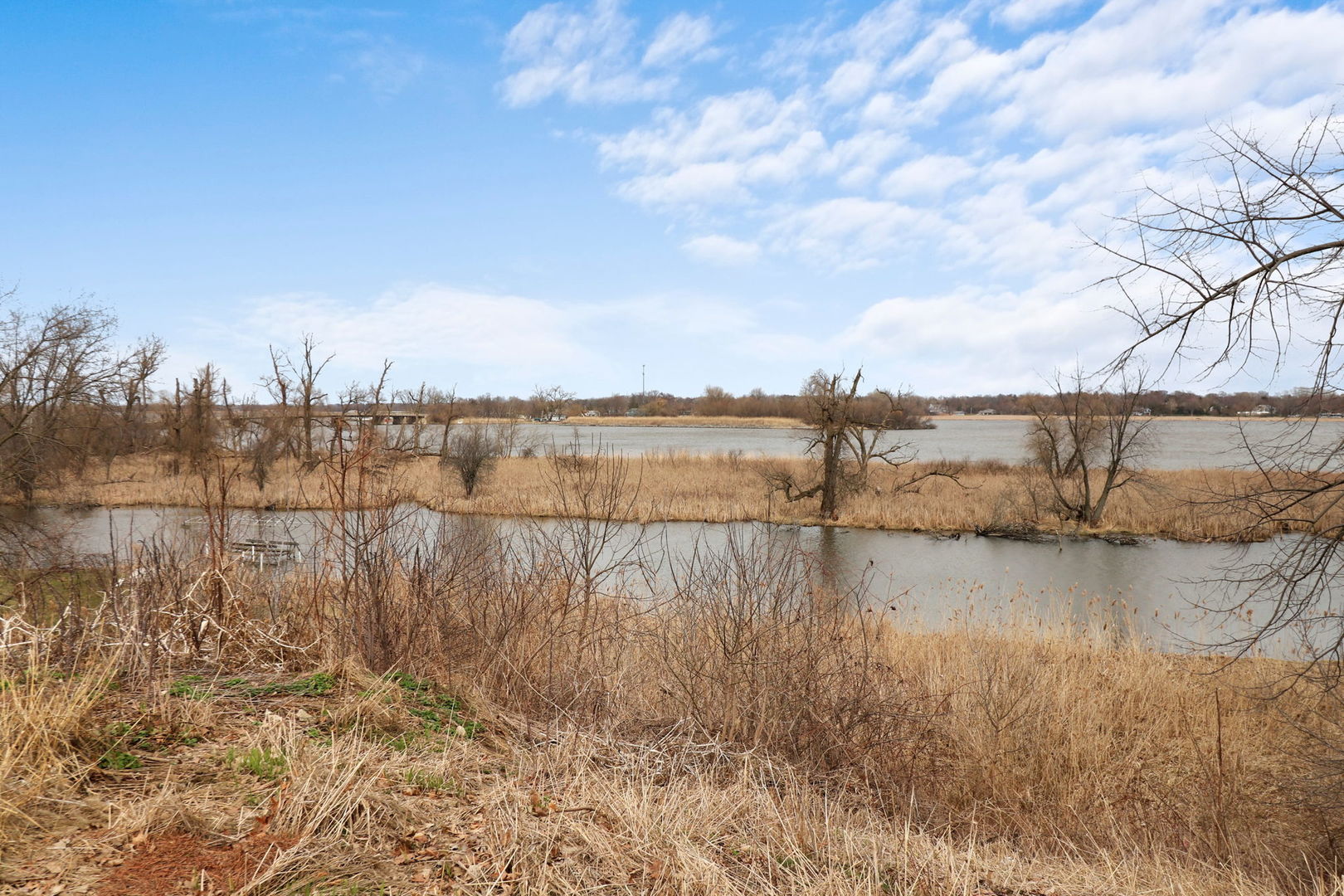 38415 North Primrose Path Spring Grove, IL 60081 - Photo 5 of 15 a view of ocean with boats and trees in the background