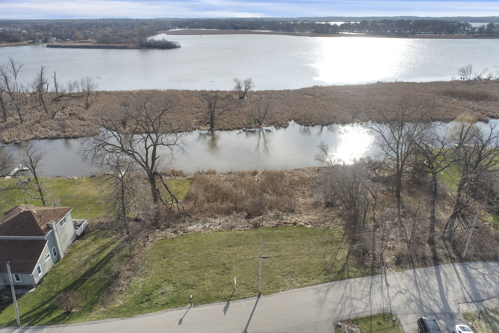 38415 North Primrose Path Spring Grove, IL 60081 - Photo 9 of 15 a view of a lake from a yard