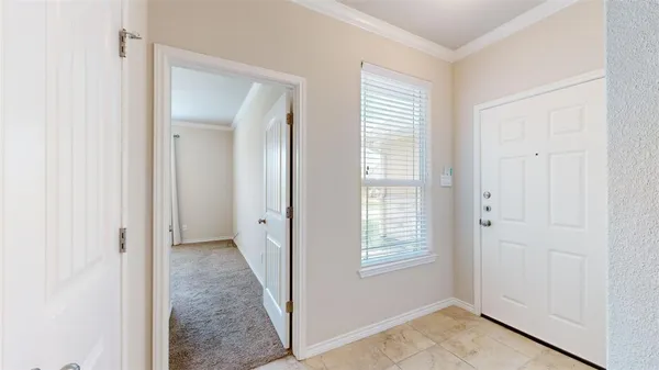 an empty room with a ceiling fan