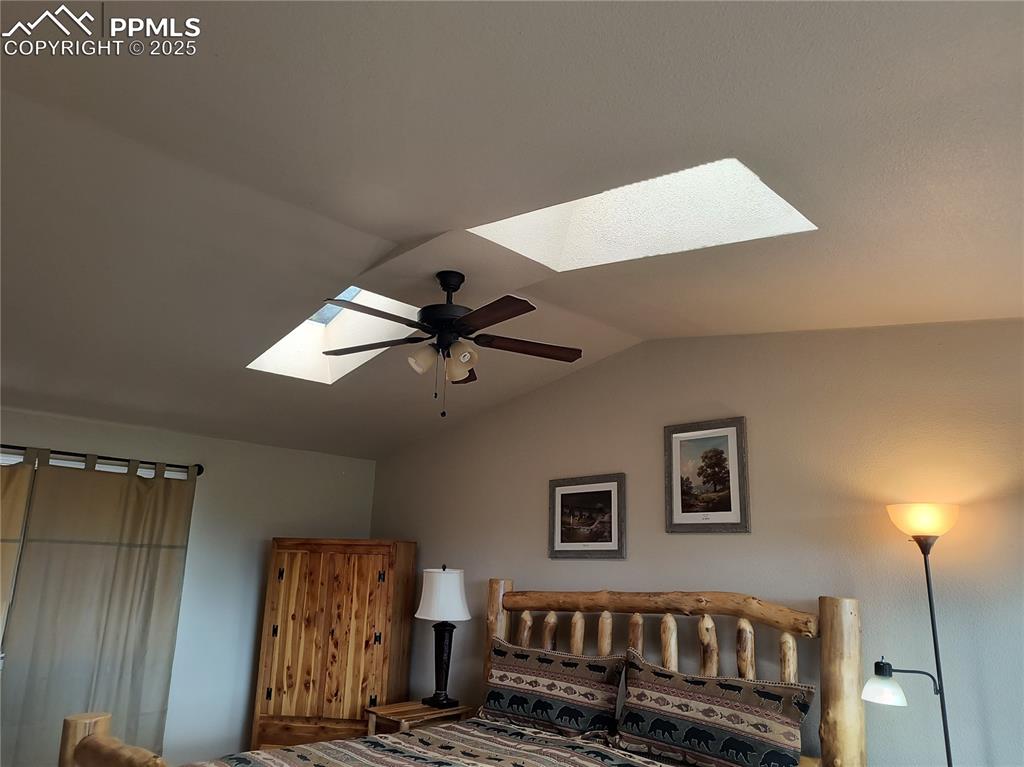 237 Blue Spruce Road Divide, CO 80814 - Photo 25 of 47 a view of a livingroom with furniture and staircase