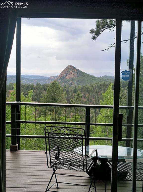 237 Blue Spruce Road Divide, CO 80814 - Photo 29 of 47 a view of a balcony with chairs