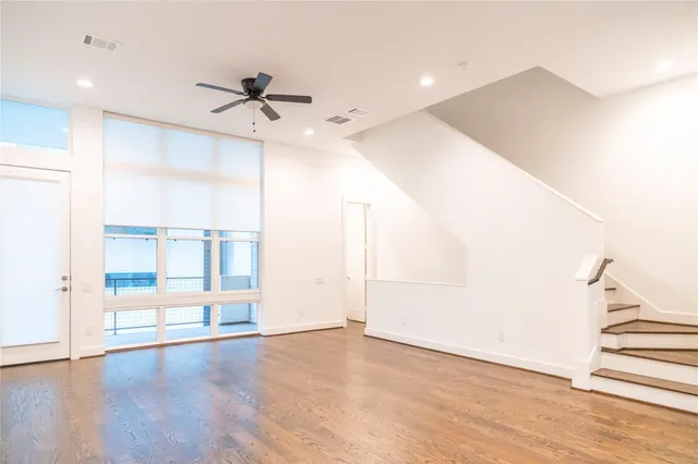 a kitchen with a stove a sink and a microwave
