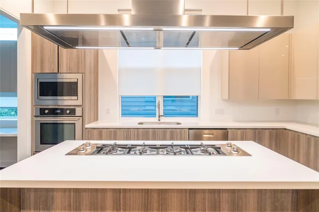 a kitchen with a stove and a kitchen