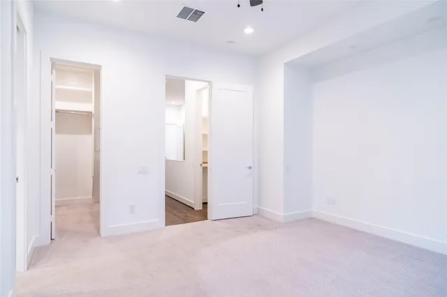a bathroom with a shower and a sink