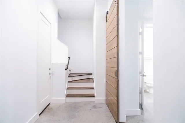 a view of staircase with white walls and white walls