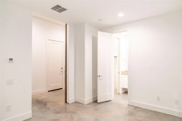 a view of a hallway with closet area
