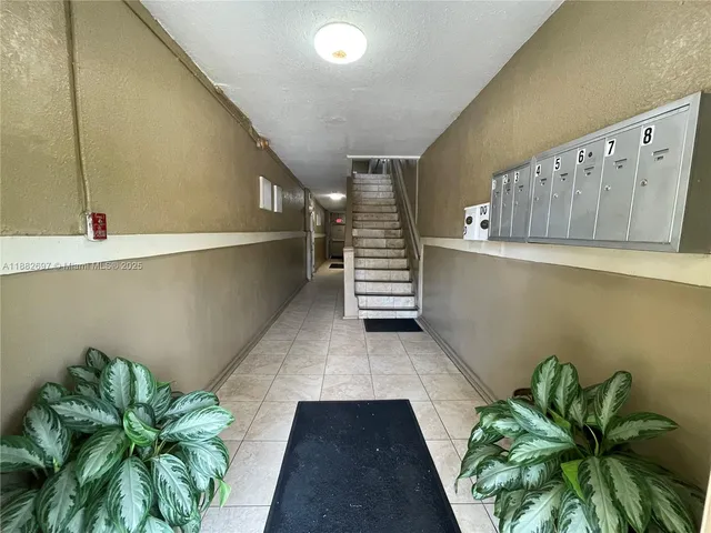 a view of entryway with stairs