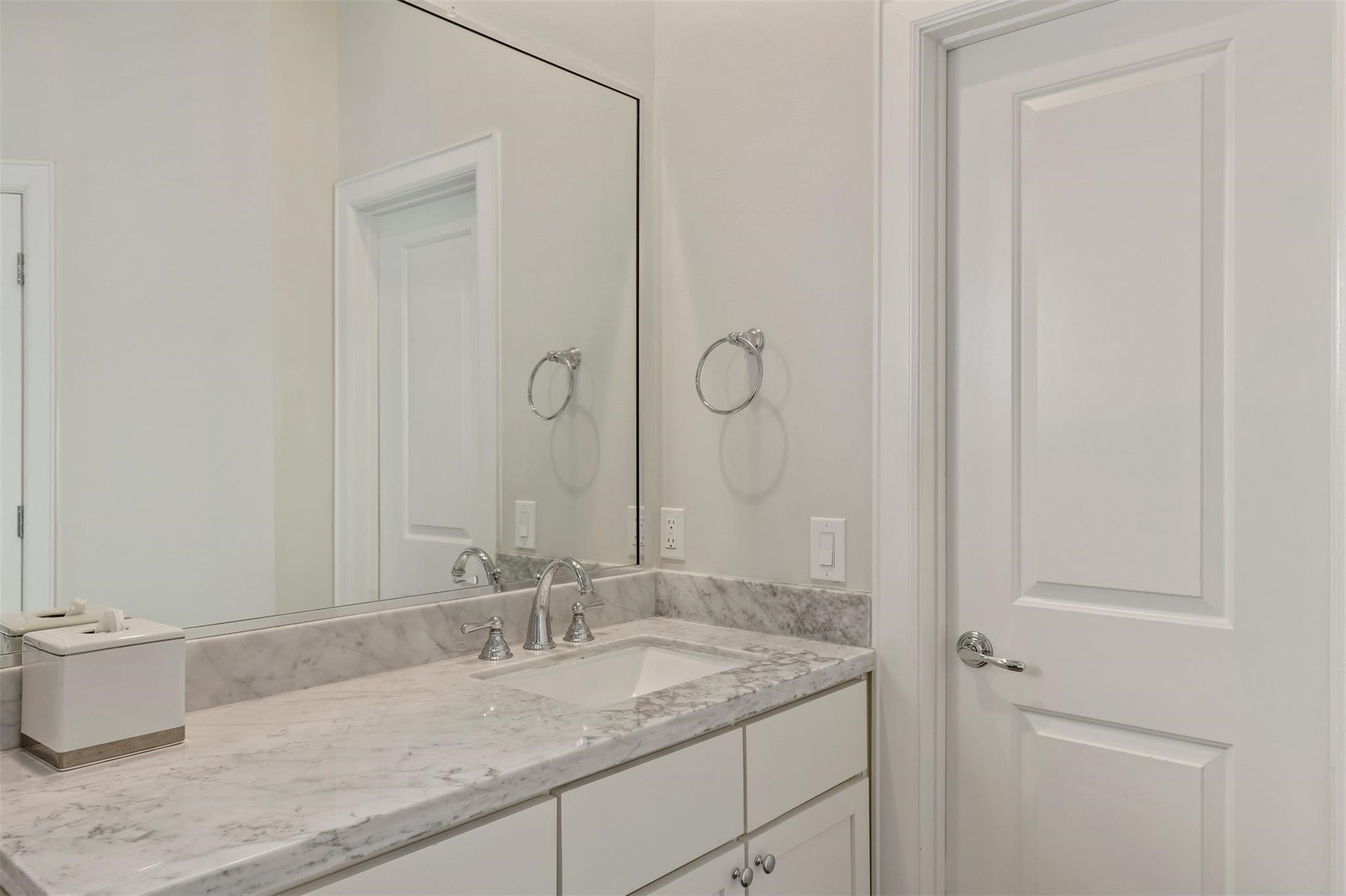 3022 Maxroy Street Houston, TX 77008 - Photo 14 of 21 a bathroom with a granite countertop sink and a mirror