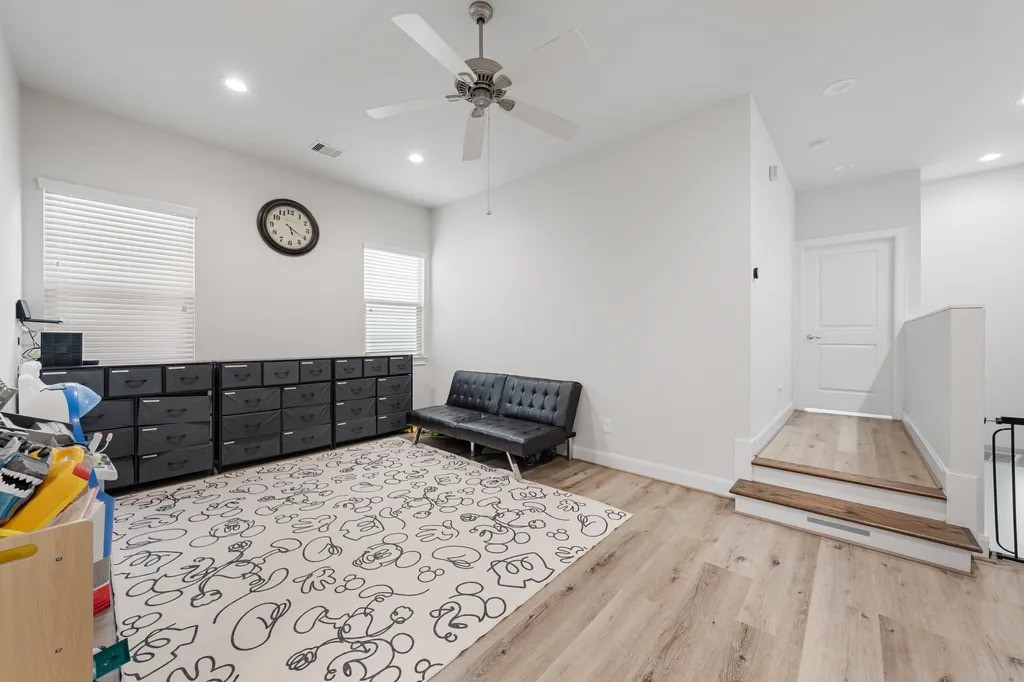 3022 Maxroy Street Houston, TX 77008 - Photo 15 of 21 a view of a livingroom with furniture and a ceiling fan