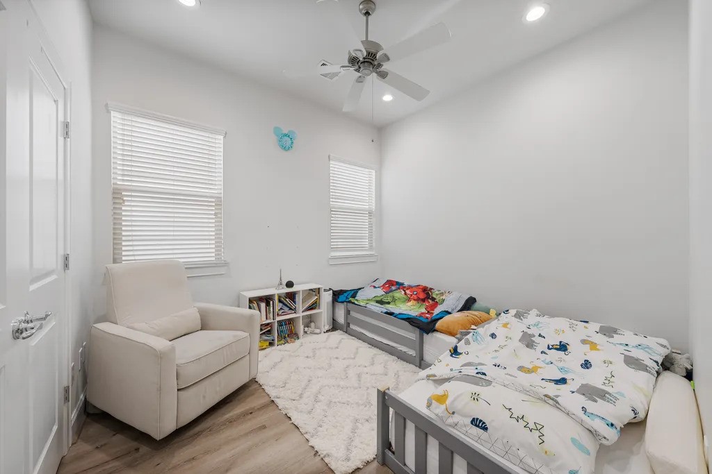 3022 Maxroy Street Houston, TX 77008 - Photo 18 of 21 a living room with furniture and a baby crib