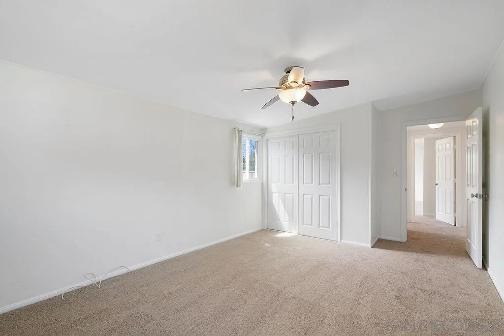 2924 Helix Street Spring Valley, CA 91977 - Photo 15 of 30 a view of a livingroom with a ceiling fan and window