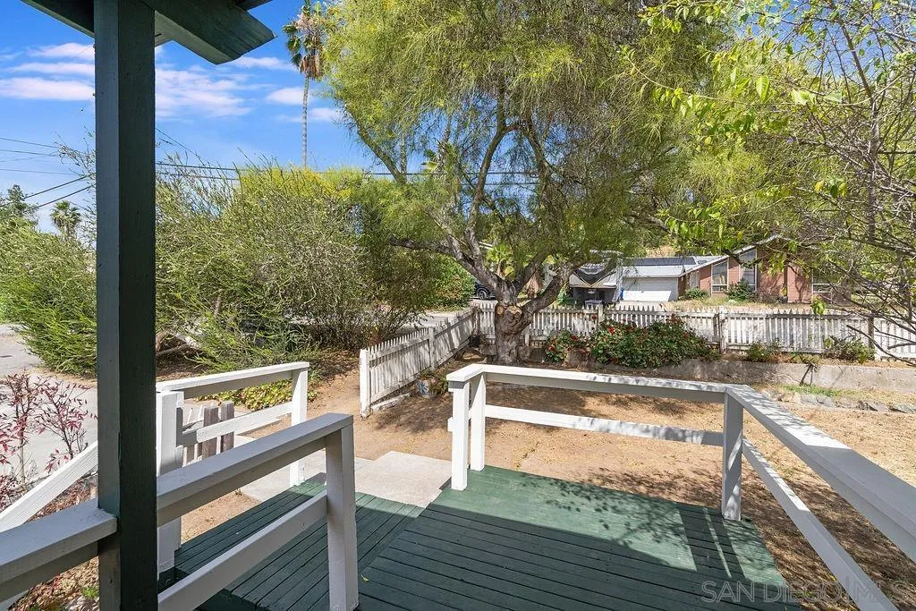 2924 Helix Street Spring Valley, CA 91977 - Photo 20 of 30 a view of balcony with wooden floor and fence
