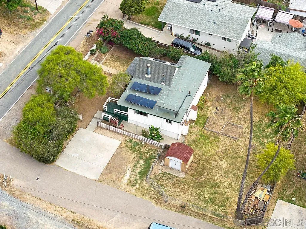 2924 Helix Street Spring Valley, CA 91977 - Photo 28 of 30 an aerial view of a house with a yard and parking