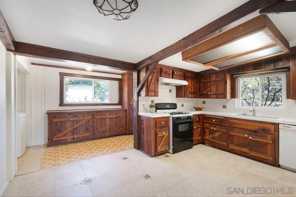 2924 Helix Street Spring Valley, CA 91977 - Photo 9 of 30 a kitchen with sink and window