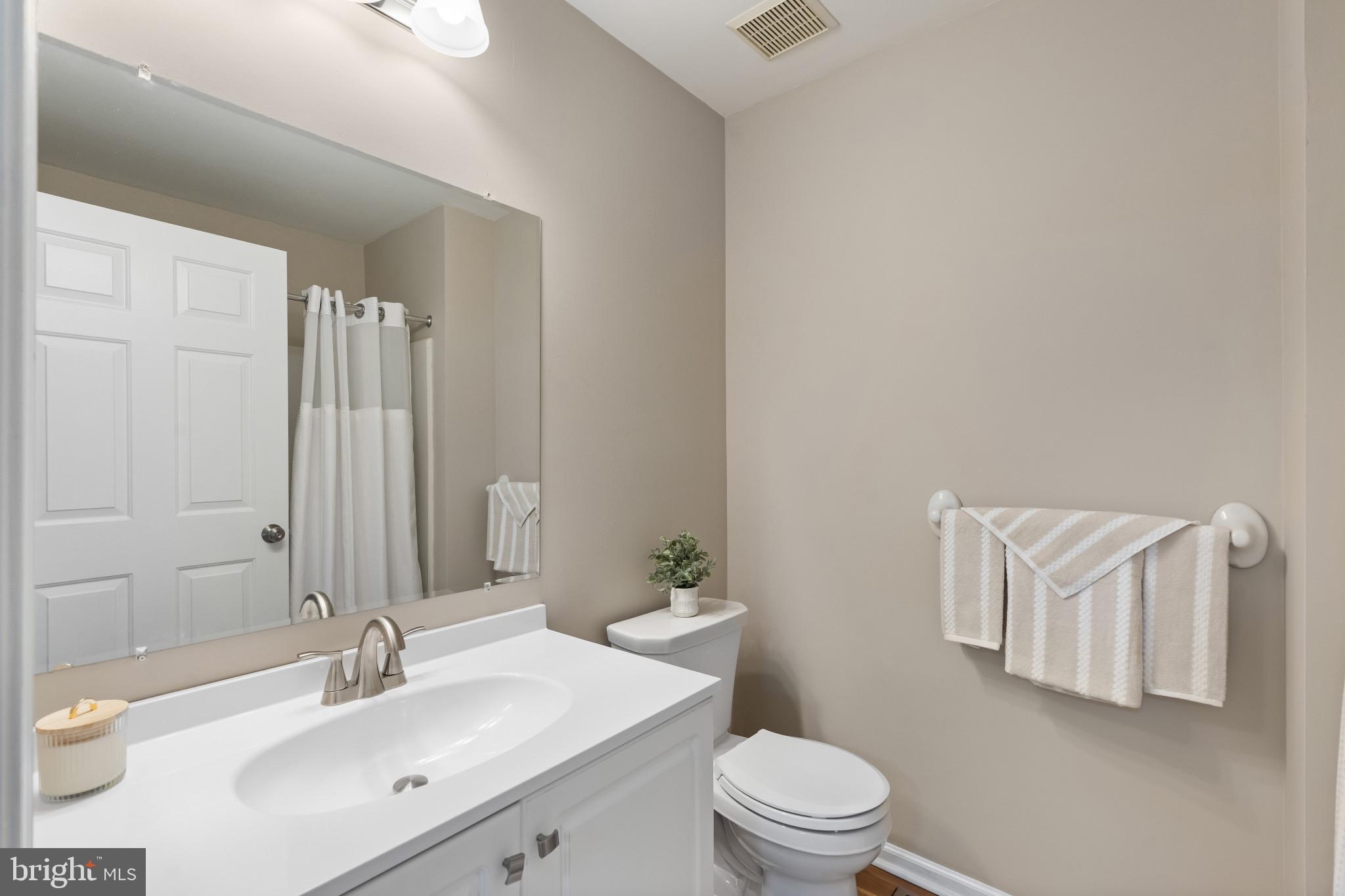 205 Kirby Way Mount Laurel, NJ 08054 - Photo 21 of 26 a bathroom with a sink toilet vanity and shower