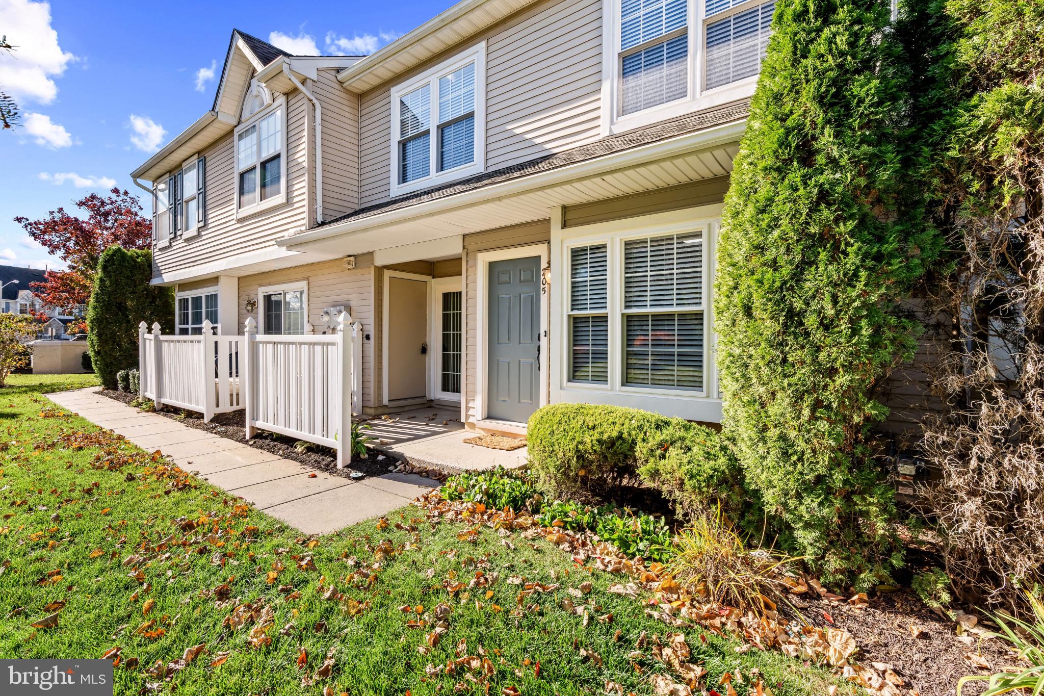 205 Kirby Way Mount Laurel, NJ 08054 - Photo 22 of 26 a view of a house with a small yard and flower plants