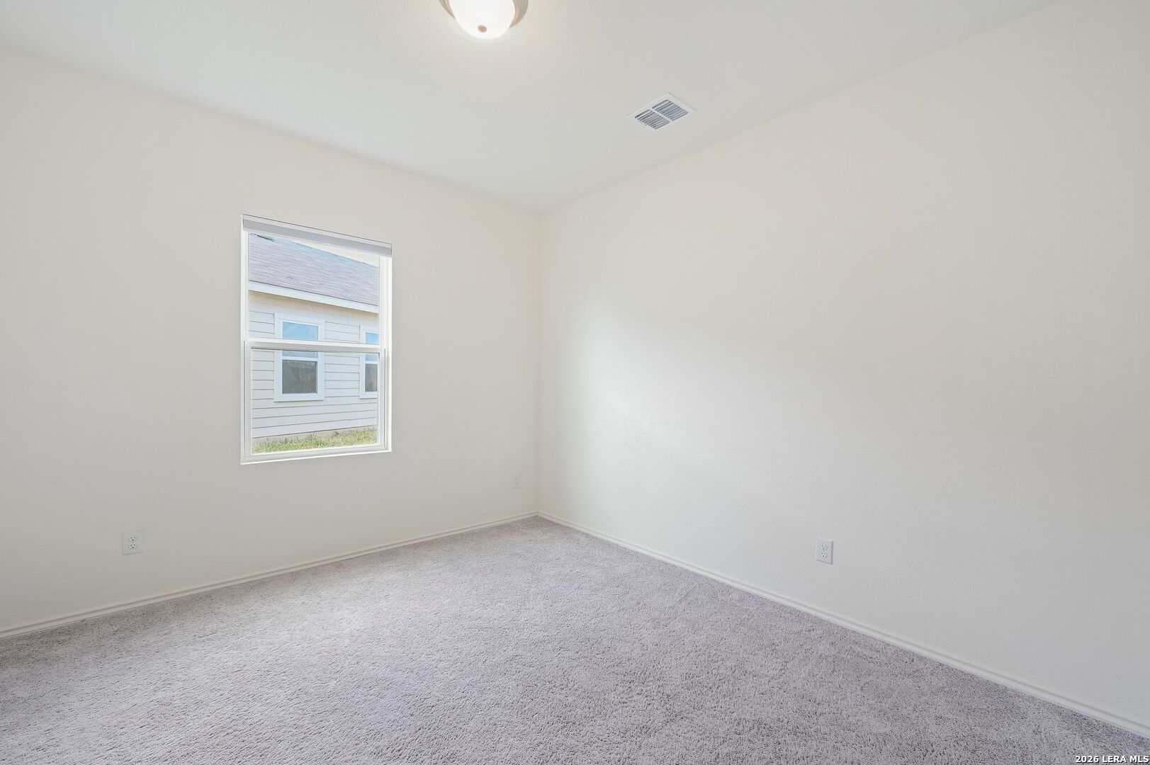 5535 Rue Girard Converse, TX 78109 - Photo 17 of 33 a view of an empty room with a window