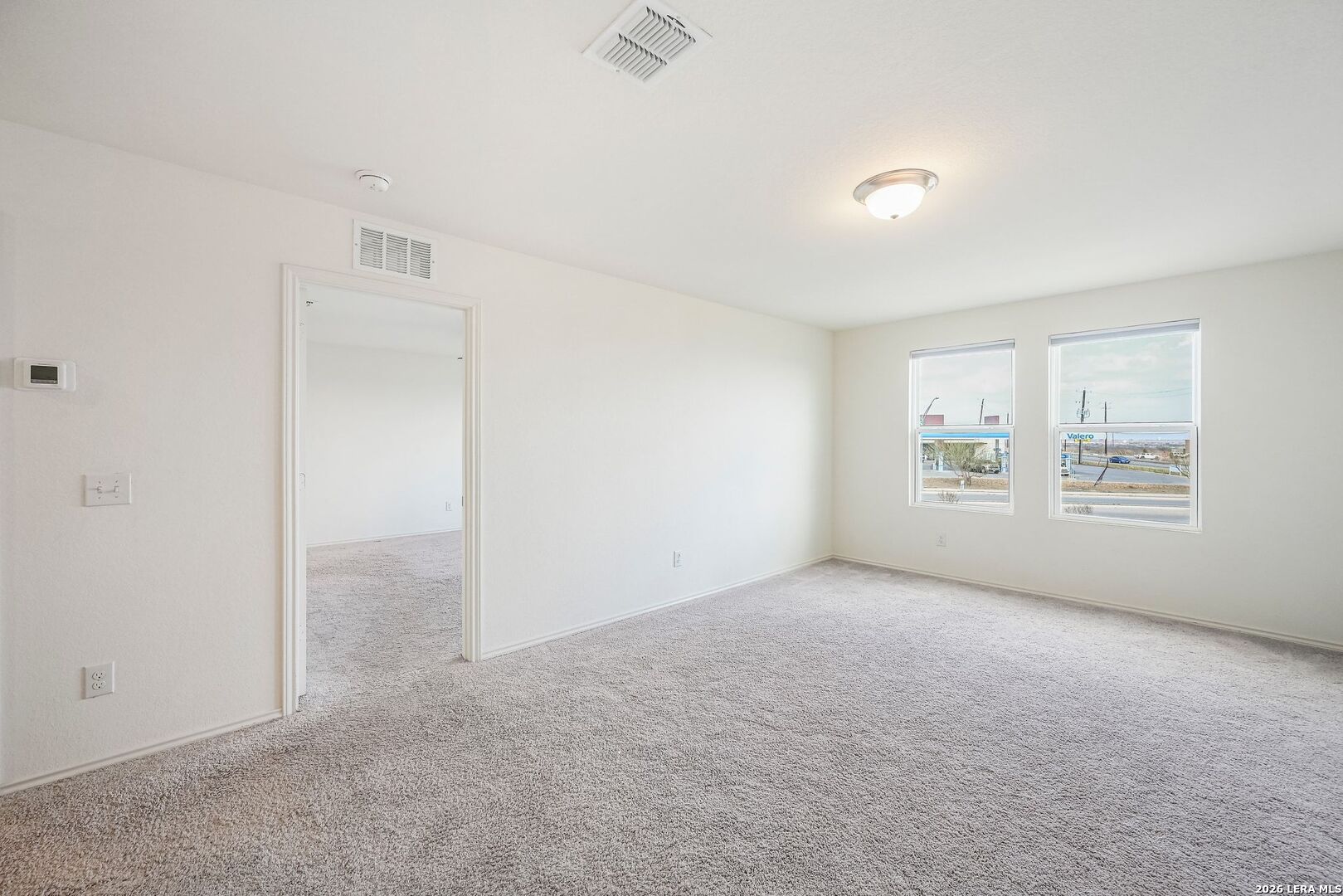 5535 Rue Girard Converse, TX 78109 - Photo 20 of 33 an empty room with windows and closet